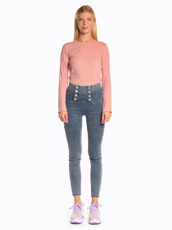 High waisted skinny jeans with decorative buttons
