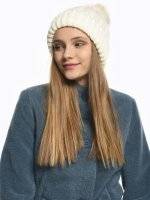 Knitted beanie with faux fur pompom