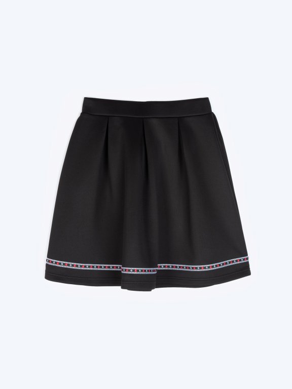 Skater skirt with decorative tape