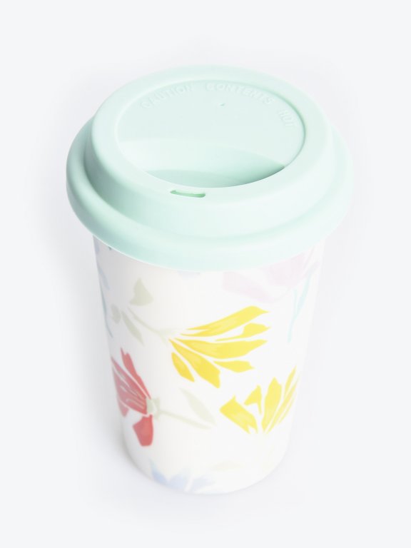 Travel mug with floral design