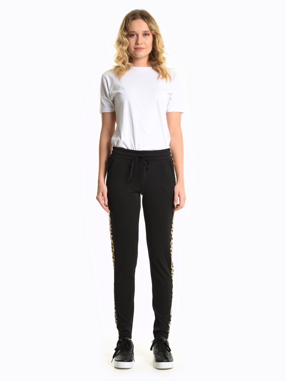 Animal tape stretch trousers