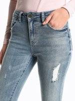Distressed slim cropped fit jeans