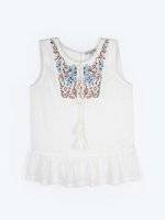 Peplum top with embroidery