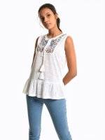 Peplum top with embroidery