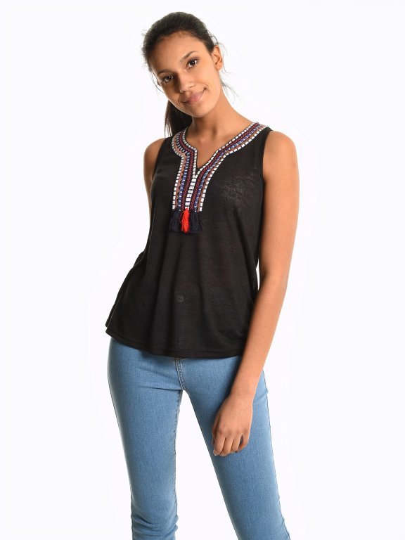 Sleeveless top with embroidery