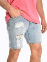 Damaged denim shorts