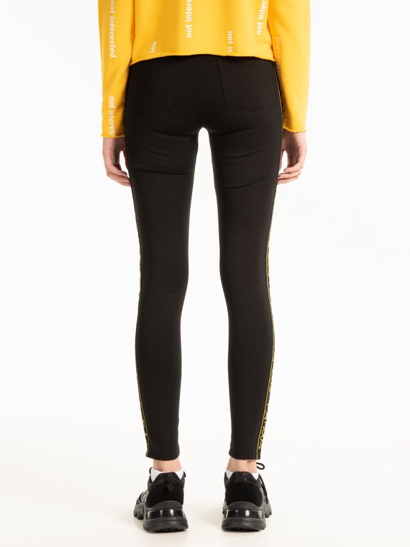 Stretch slim trousers with decorative tape