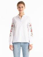 Shirt with emroidery on sleeves