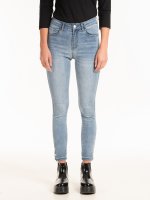 Skinny jeans with decorative pearls on hem