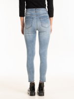 Skinny jeans with decorative pearls on hem