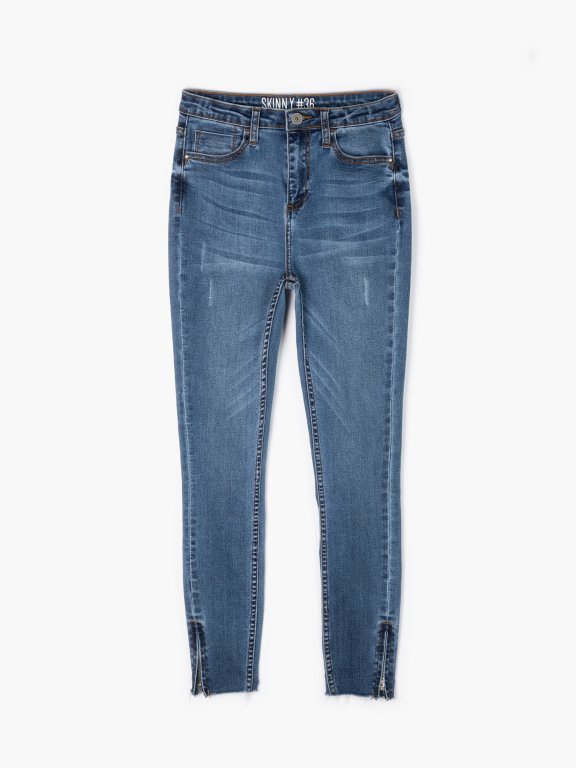 Skinny jeans with zippers on hems