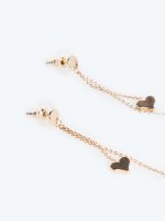 Long drop earrings with heart pendant