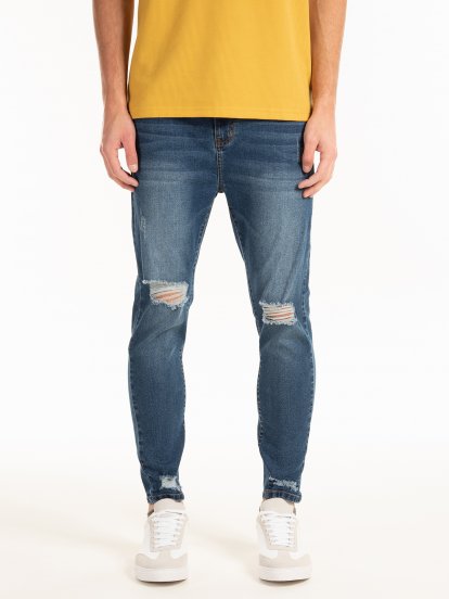 Slim fit jeans with damages