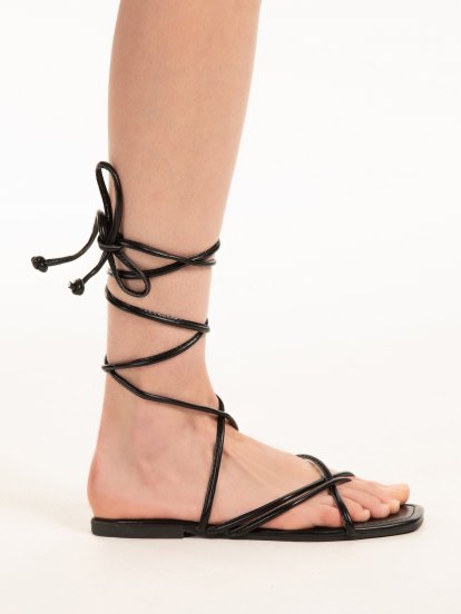 Lace-up flat sandals