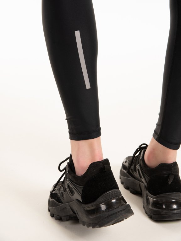 Sportowe legginsy z odblaskowym paskiem