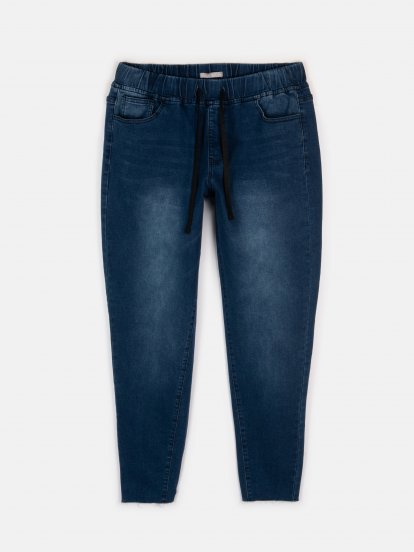 Modré džínsy s obnoseným vzhľadom s elastickým pásom
