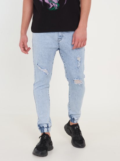 Distressed washed jogger fit jeans