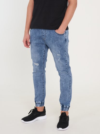Distressed washed jogger fit jeans