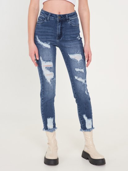 Slim jeans with damages in dark blue wash