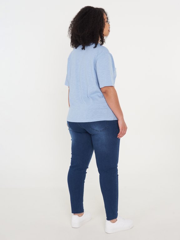 Damaged jeans with elastic waist in blue wash
