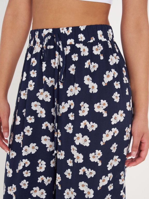 Široké kalhoty s květinovým potiskem dámské