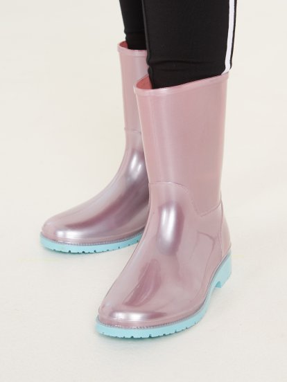 Shiny wellington boots