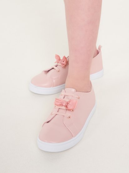 Slip-on shoes with bow