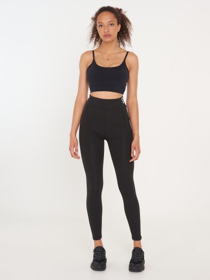 Sports leggings with pockets and slogan