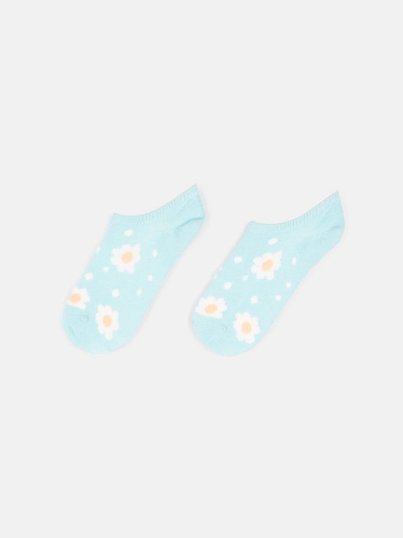 Patterned footies with silicone heel