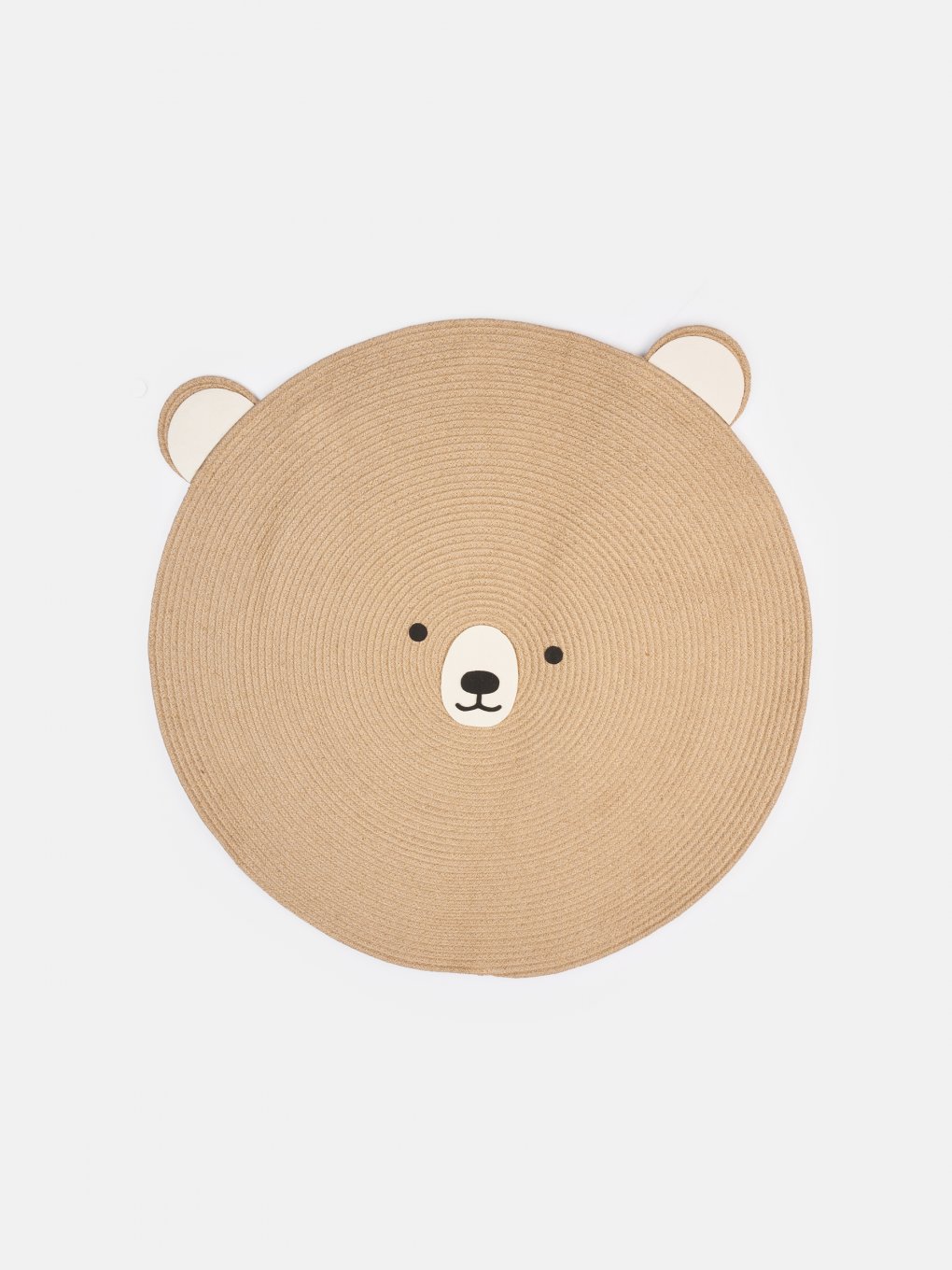Okrúhly koberec v tvare medveďa