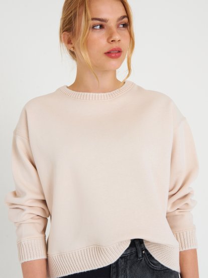 Sweatshirt with knitted rib