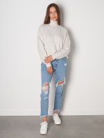 Cable knit roll neck sweater
