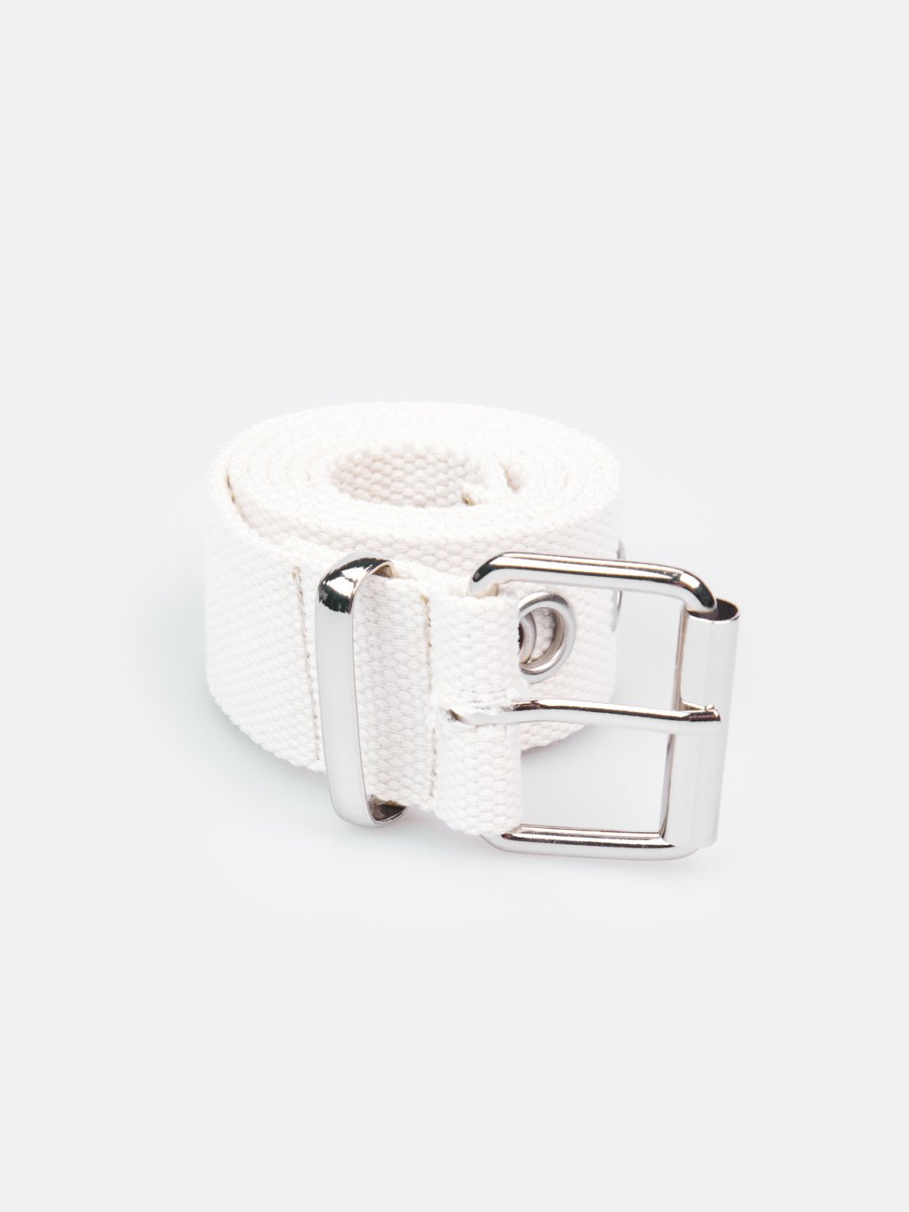 Belt with metal eyelets