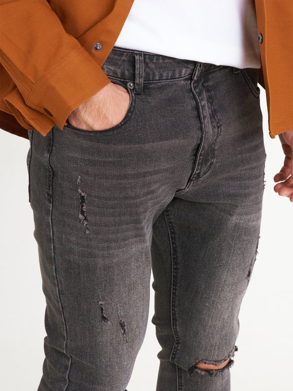 Distressed slim fit jeans