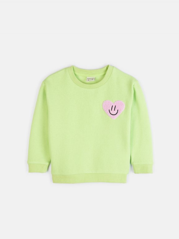 Sweatshirt with heart terry patch