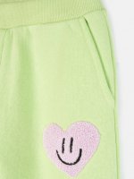 Spodnie dresowe z naszywką frotte w kształcie serca dla dziewczynek