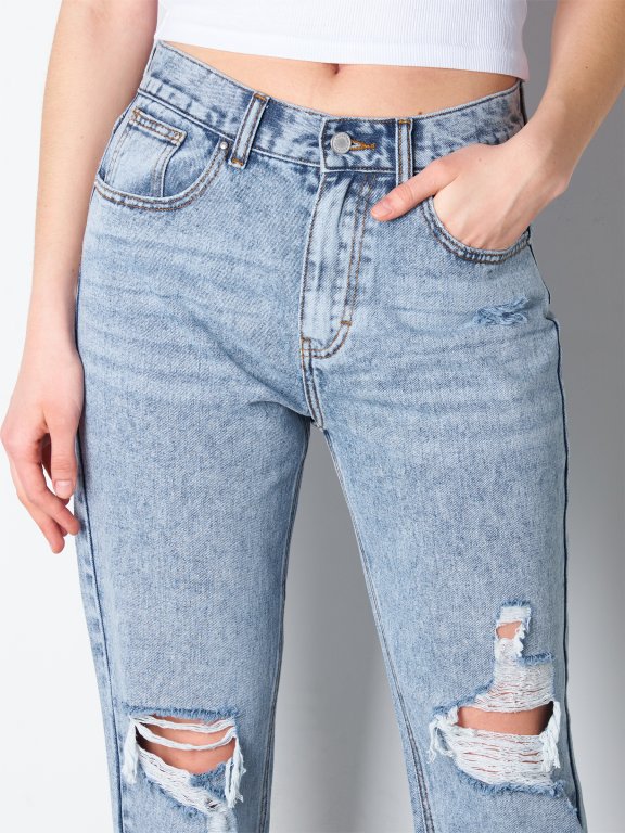 Damskie jeansy o regularnym kroju z dziurami