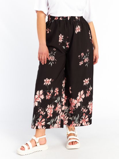 Kvetované nohavice plus size dámske