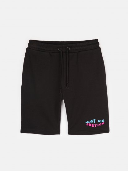 Sweat shorts with slogan print
