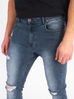 Distressed slim jeans