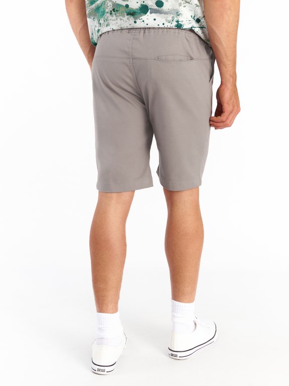 Pantaloni scurți elastici pentru bărbați cu buzunare