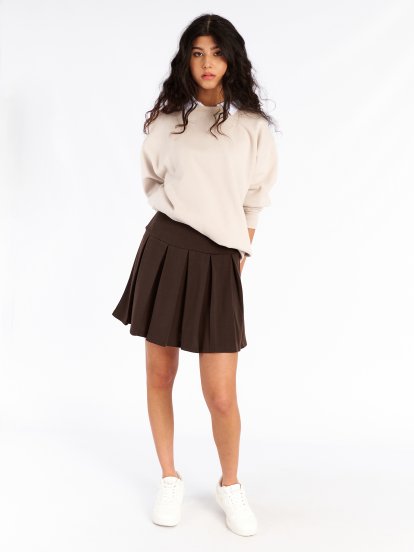 Pleated knitted mini skirt