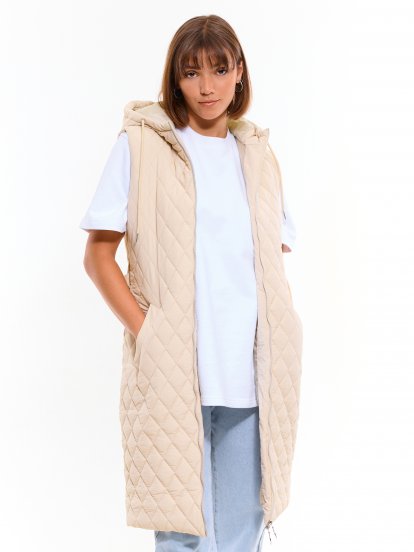 Dlhá prešívaná vesta s kapucňou na zips dámska