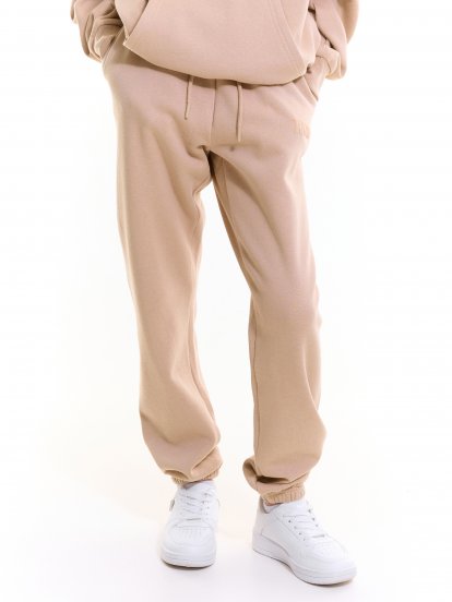Oversizowe spodnie dresowe z napisem