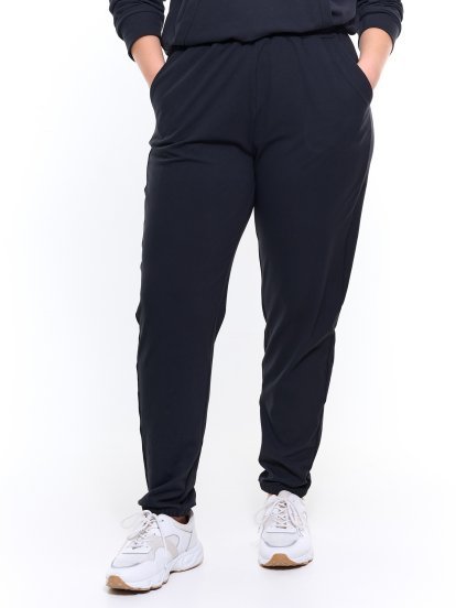 Damskie spodnie dresowe typu jogger z kieszeniami w jednolitym kolorze