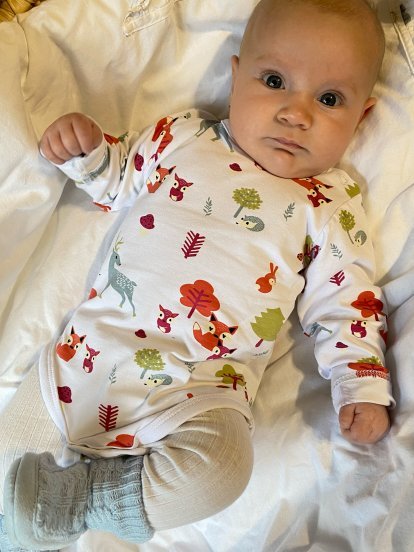 Cotton baby bodysuit with forest print