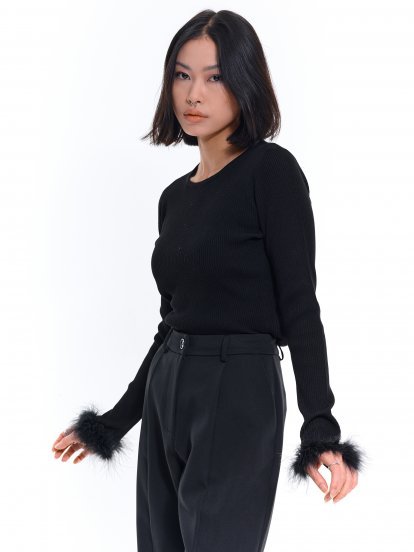 Pullover with feathers on sleeves